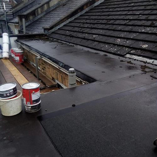 Reroofing flat roof